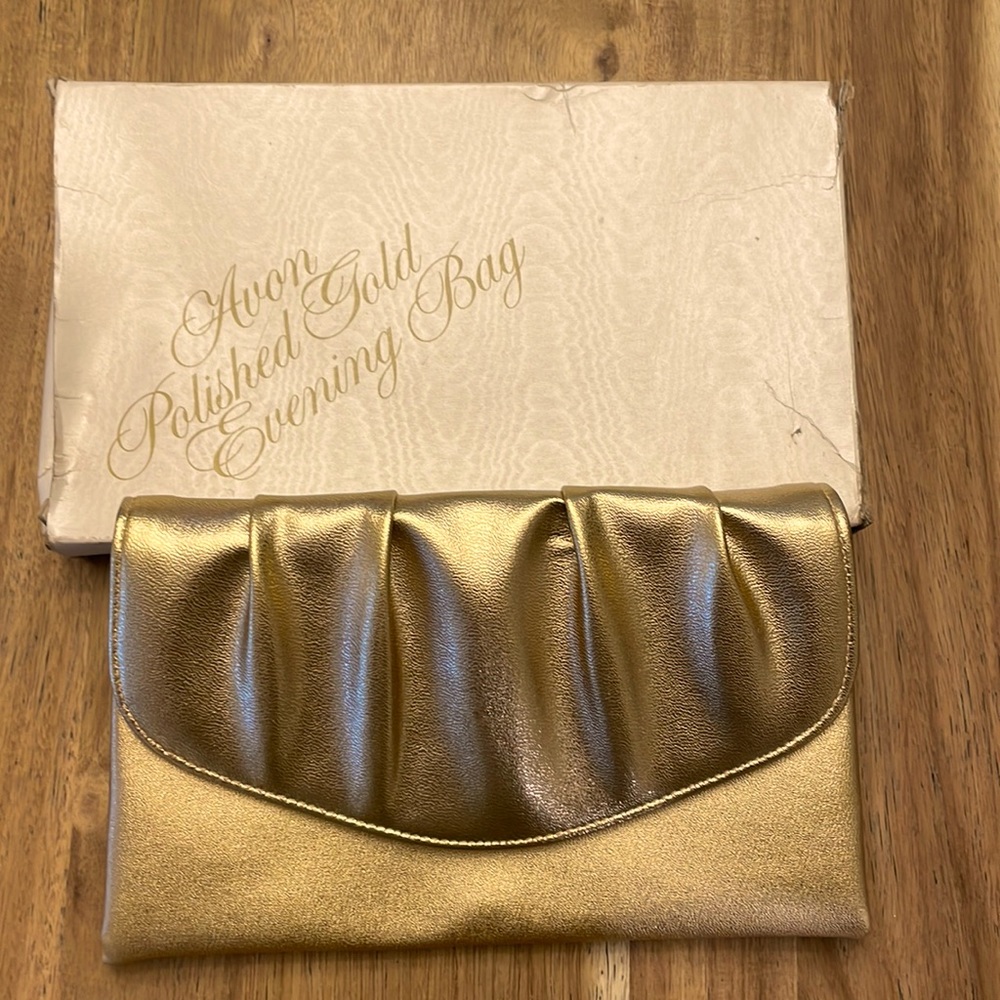 I vintage Avon polished gold evening bag with box